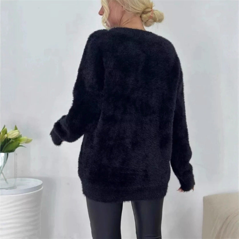 Damernas fluffiga cardigan med stora fickor och avslappnad passform Mirla-Eva Jonsson