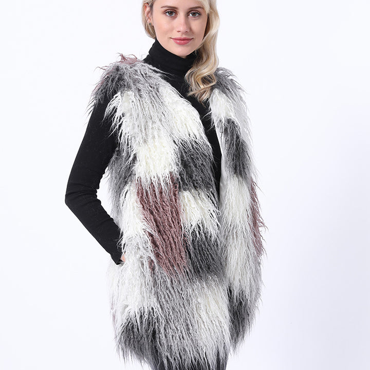 Damernas fluffiga konstpälsväst i patchworkdesign Mirla-Eva Jonsson
