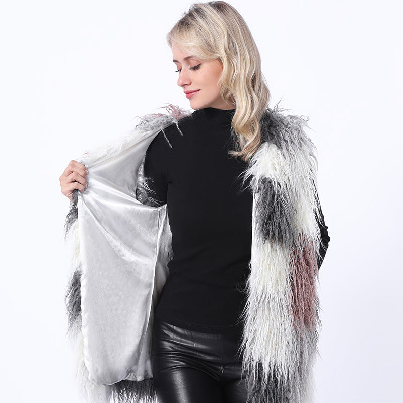 Damernas fluffiga konstpälsväst i patchworkdesign Mirla-Eva Jonsson