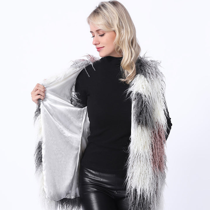 Damernas fluffiga konstpälsväst i patchworkdesign Mirla-Eva Jonsson