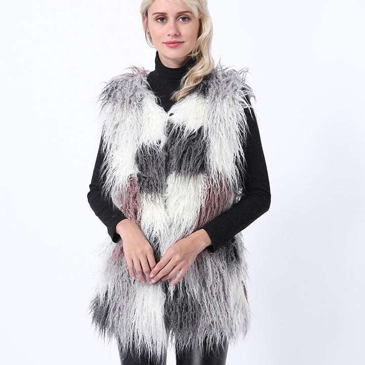 Damernas fluffiga konstpälsväst i patchworkdesign Mirla-Eva Jonsson