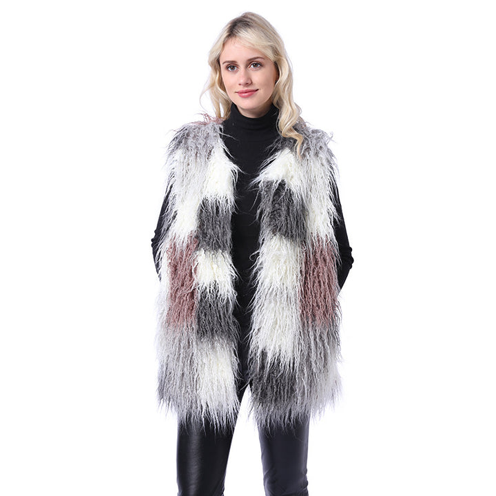 Damernas fluffiga konstpälsväst i patchworkdesign Mirla-Eva Jonsson