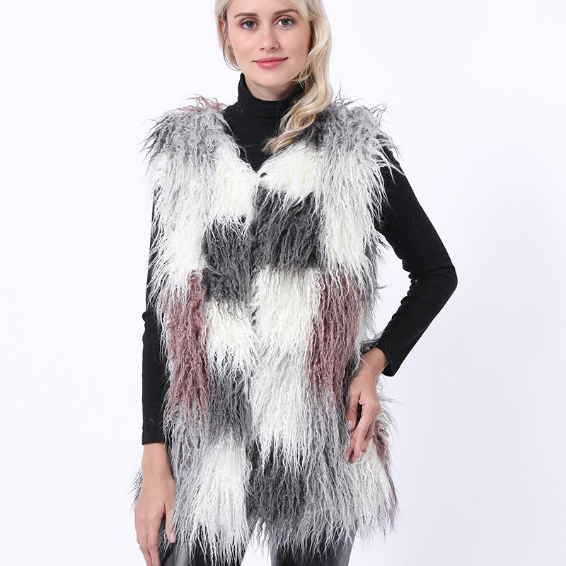 Damernas fluffiga konstpälsväst i patchworkdesign Mirla-Eva Jonsson