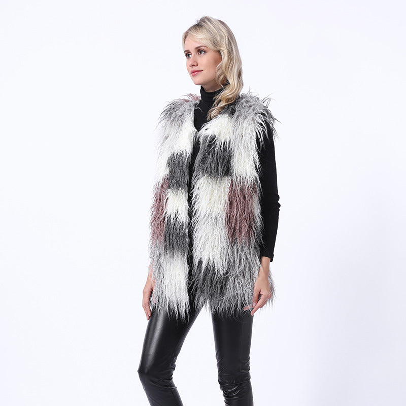 Damernas fluffiga konstpälsväst i patchworkdesign Mirla-Eva Jonsson