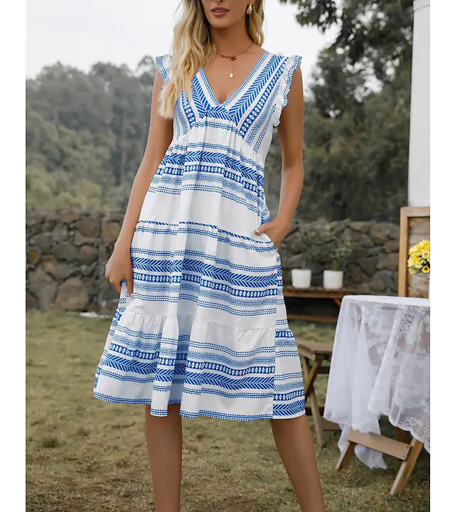 Damernas fritidsklänning med raffinerade volangdetaljer och stiligt bältesdesign Eva Jonsson-Eva Jonsson