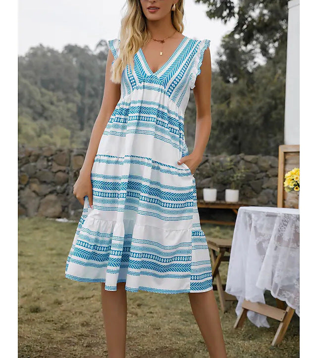 Damernas fritidsklänning med raffinerade volangdetaljer och stiligt bältesdesign Eva Jonsson-Eva Jonsson