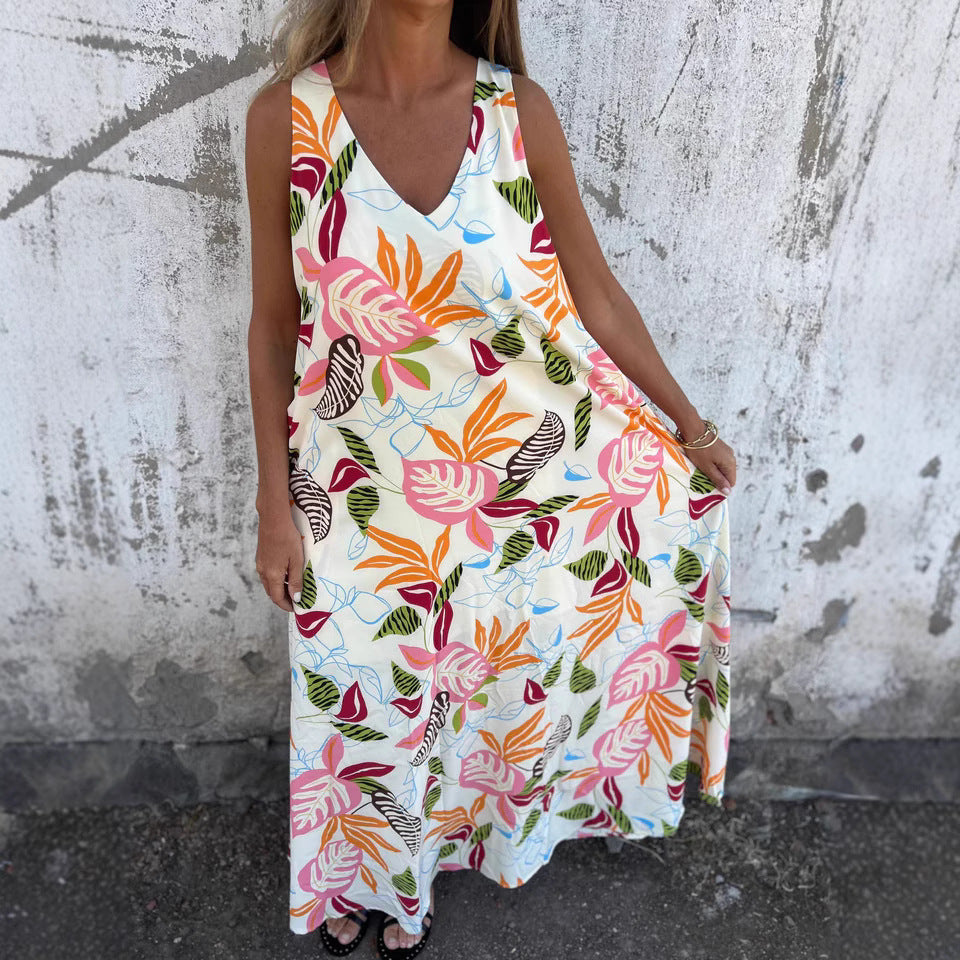Damernas fritidsmaxiklänning med blommigt mönster och praktiska fickor Eva Jonsson-Eva Jonsson