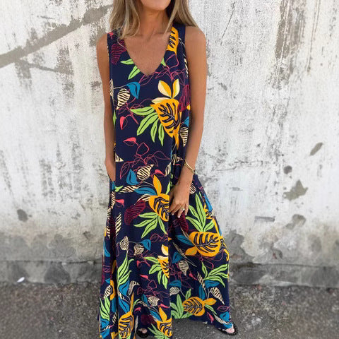 Damernas fritidsmaxiklänning med blommigt mönster och praktiska fickor Eva Jonsson-Eva Jonsson