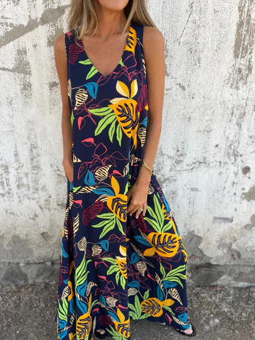 Damernas fritidsmaxiklänning med blommigt mönster och praktiska fickor Eva Jonsson-Eva Jonsson