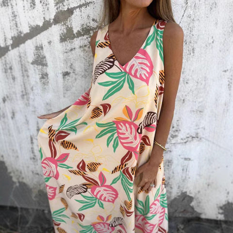 Damernas fritidsmaxiklänning med blommigt mönster och praktiska fickor Eva Jonsson-Eva Jonsson