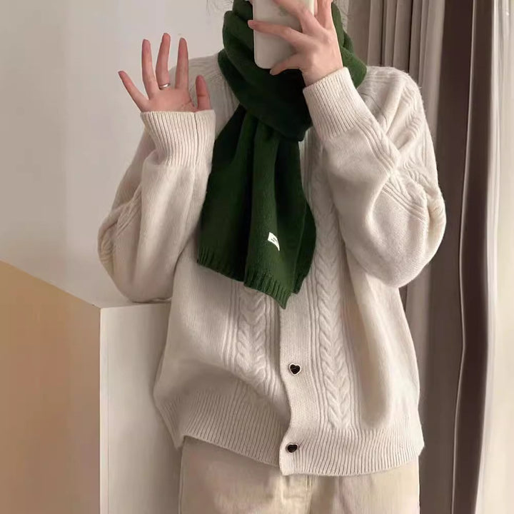 Damernas grovstickad cardigan med hjärtkknäppning och fin struktur Mirla-Eva Jonsson