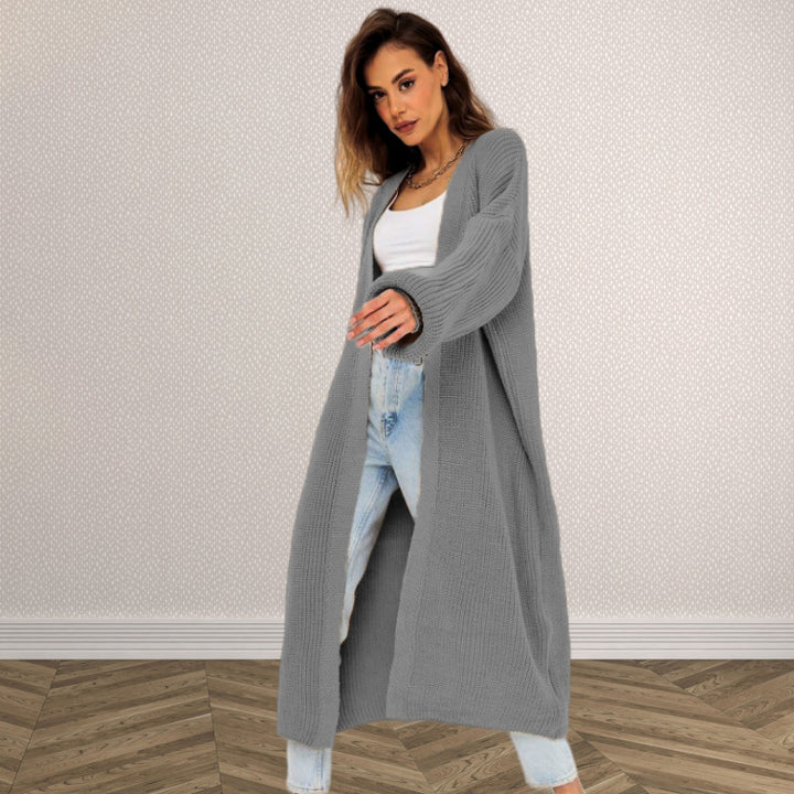 Damernas grovstickad cardigan med öppen stil och avslappnad elegans Eva Jonsson-Eva Jonsson