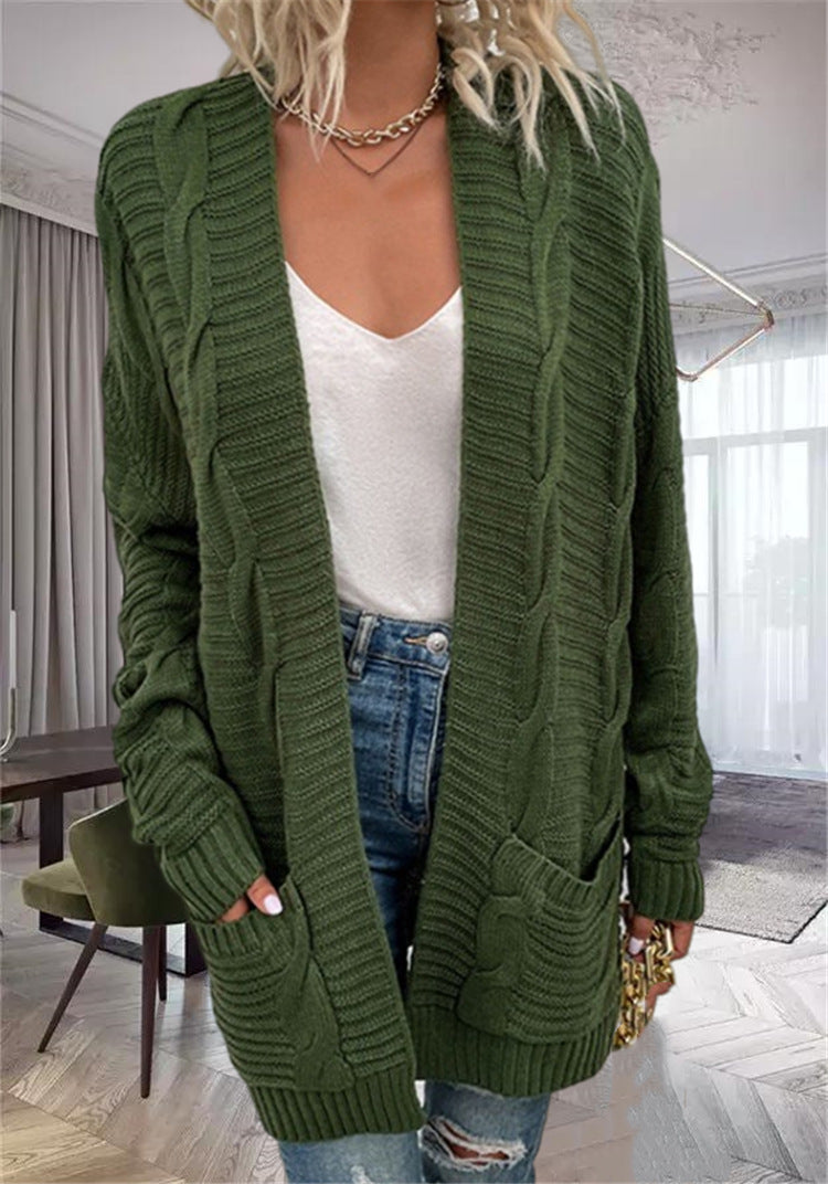 Damernas grovstickad cardigan med strukturerade ärmar och djupa fickor Mirla-Eva Jonsson