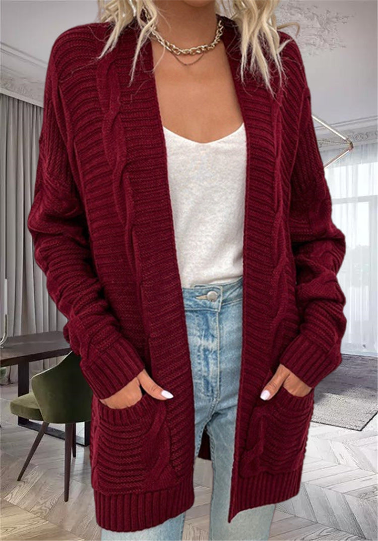 Damernas grovstickad cardigan med strukturerade ärmar och djupa fickor Mirla-Eva Jonsson