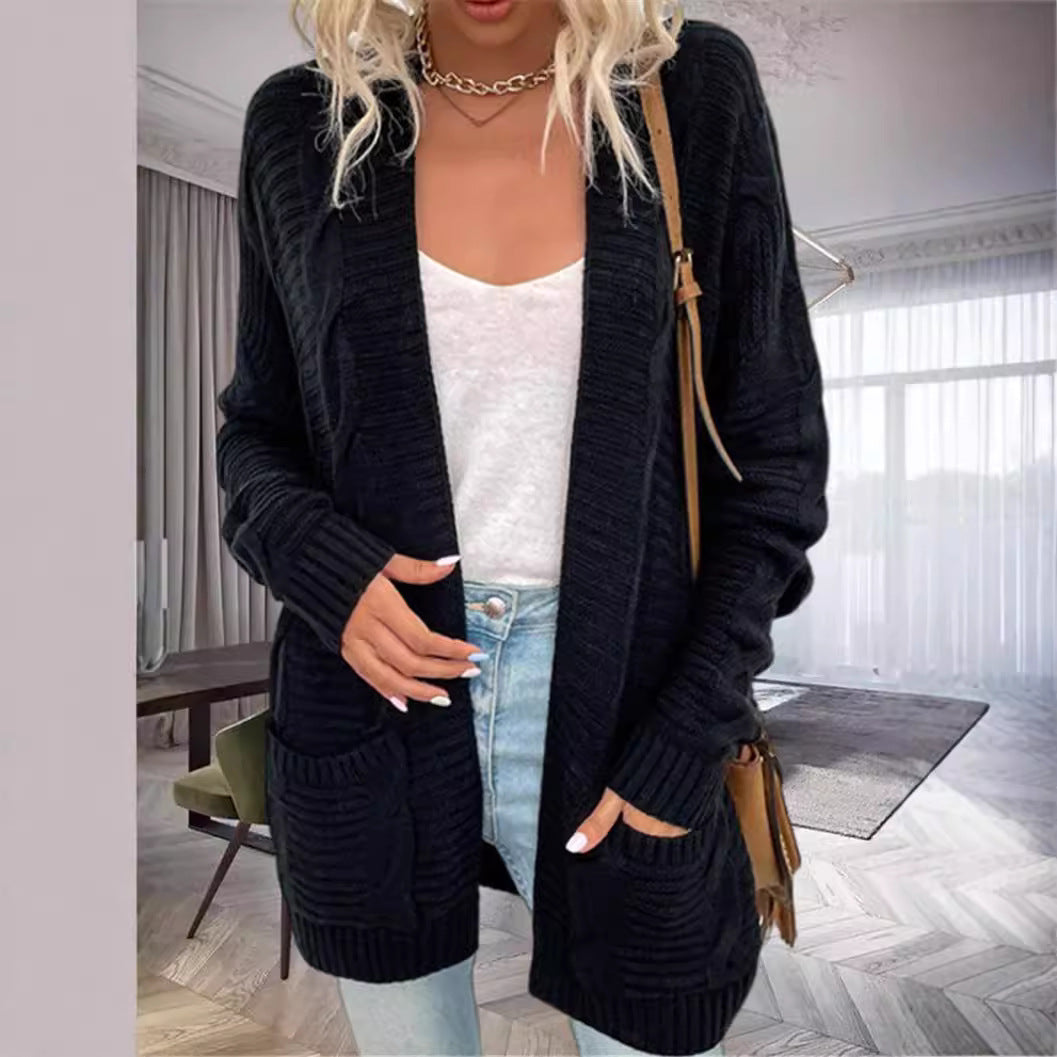 Damernas grovstickad cardigan med strukturerade ärmar och djupa fickor Mirla-Eva Jonsson