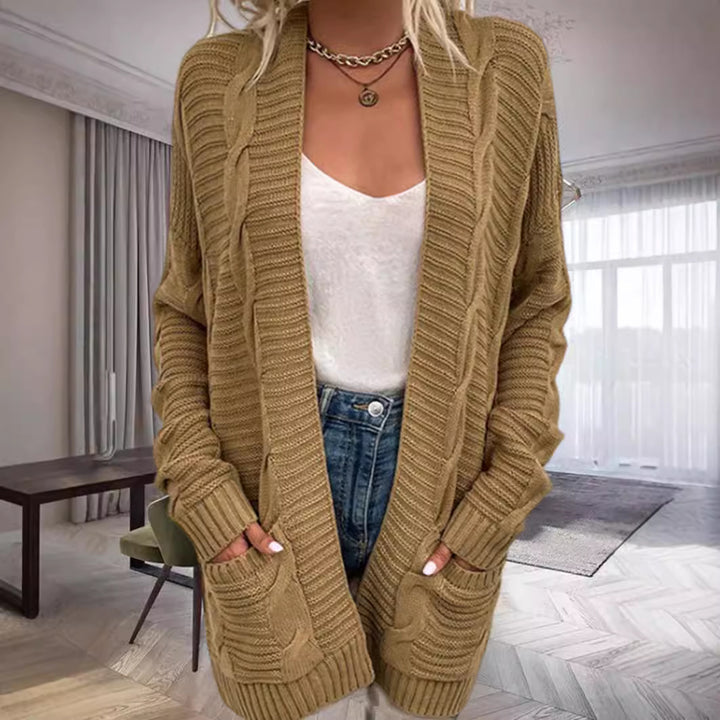 Damernas grovstickad cardigan med strukturerade ärmar och djupa fickor Mirla-Eva Jonsson