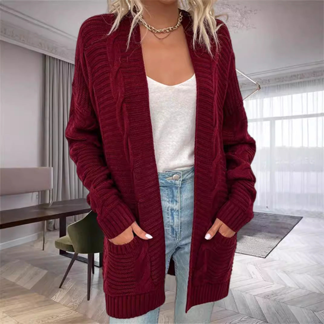 Damernas grovstickad cardigan med strukturerade ärmar och djupa fickor Mirla-Eva Jonsson