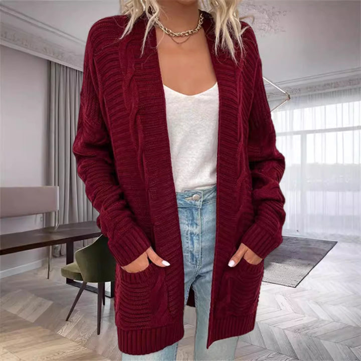 Damernas grovstickad cardigan med strukturerade ärmar och djupa fickor Mirla-Eva Jonsson