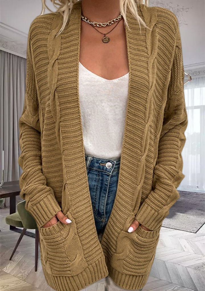 Damernas grovstickad cardigan med strukturerade ärmar och djupa fickor Mirla-Eva Jonsson