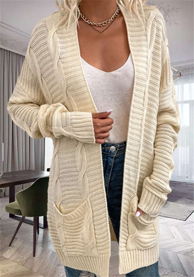 Damernas grovstickad cardigan med strukturerade ärmar och djupa fickor Mirla-Eva Jonsson