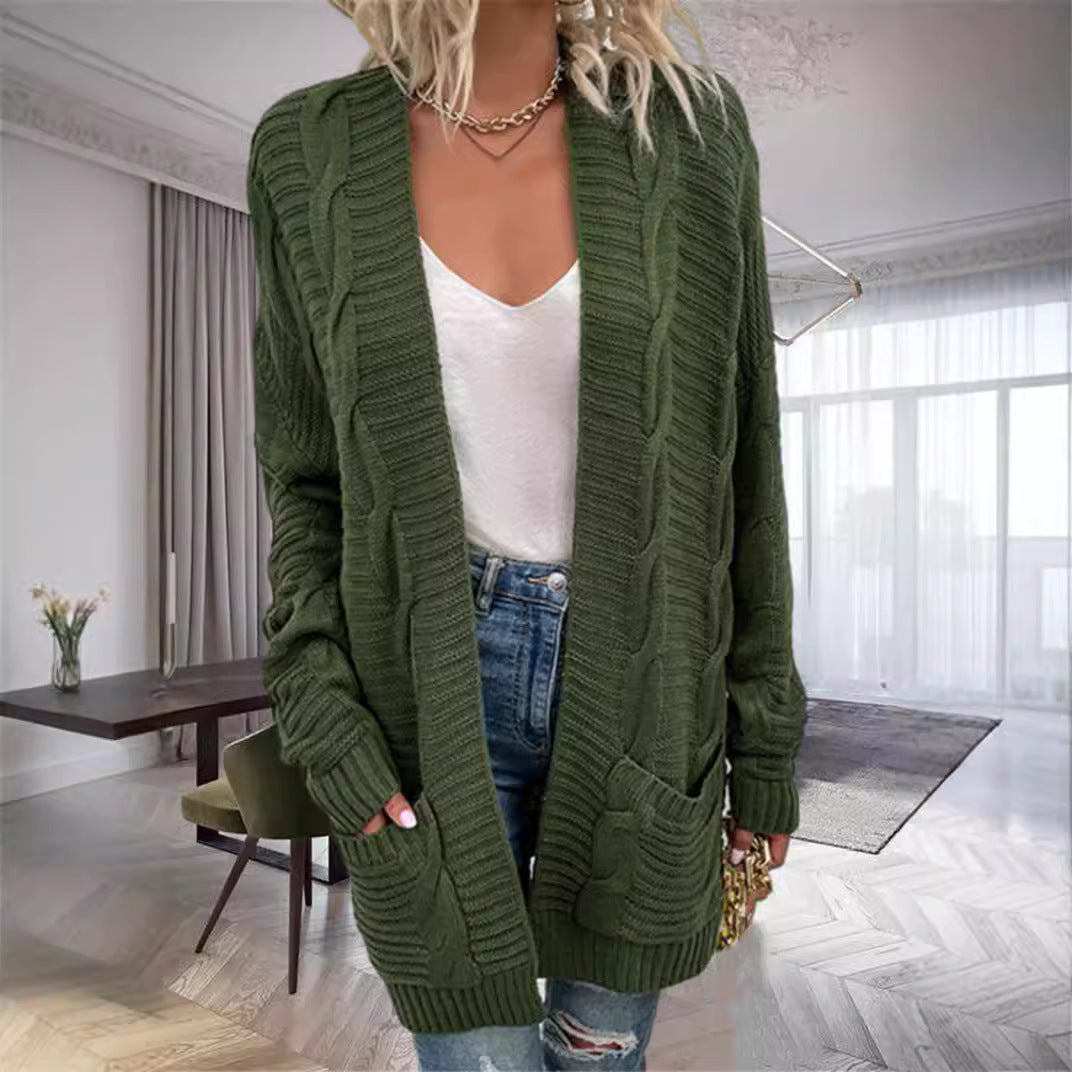 Damernas grovstickad cardigan med strukturerade ärmar och djupa fickor Mirla-Eva Jonsson