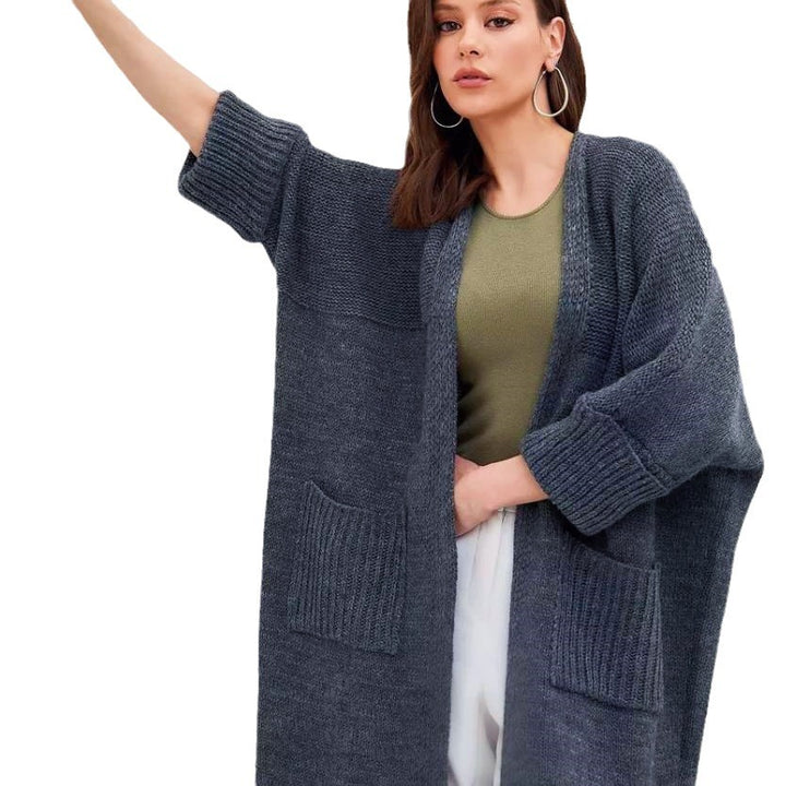 Damernas grovstickad kimono med praktiska fickor och lös passform Mirla-Eva Jonsson