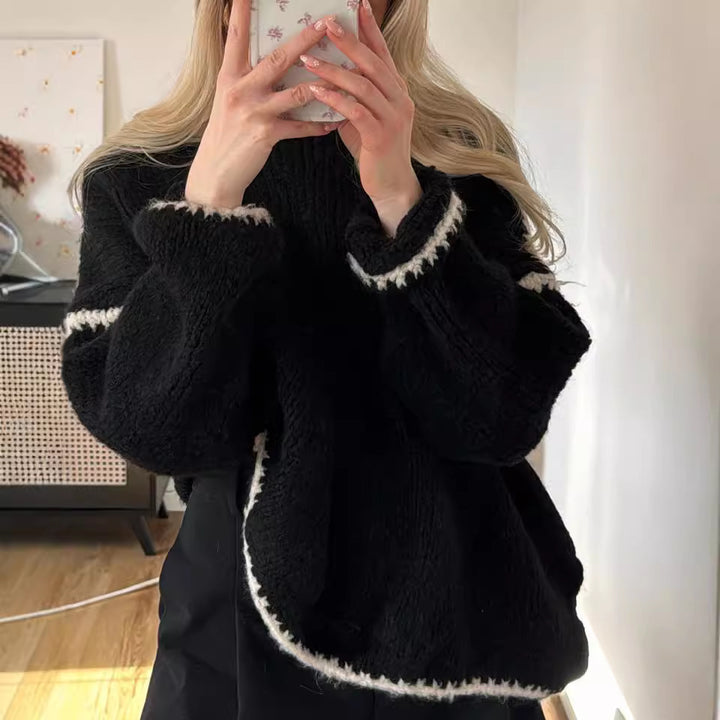 Damernas grovstickad tröja med kontrasterande avslut och lös passform Mirla-Eva Jonsson