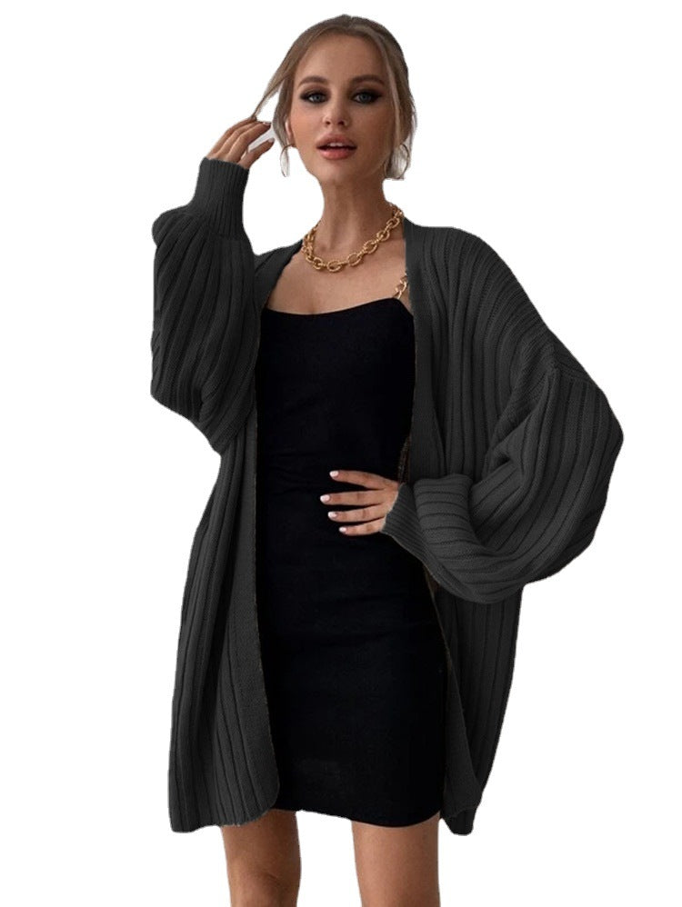 Damernas grovt stickade cardigan med voluminösa ärmar och öppen framsida Eva Jonsson-Eva Jonsson