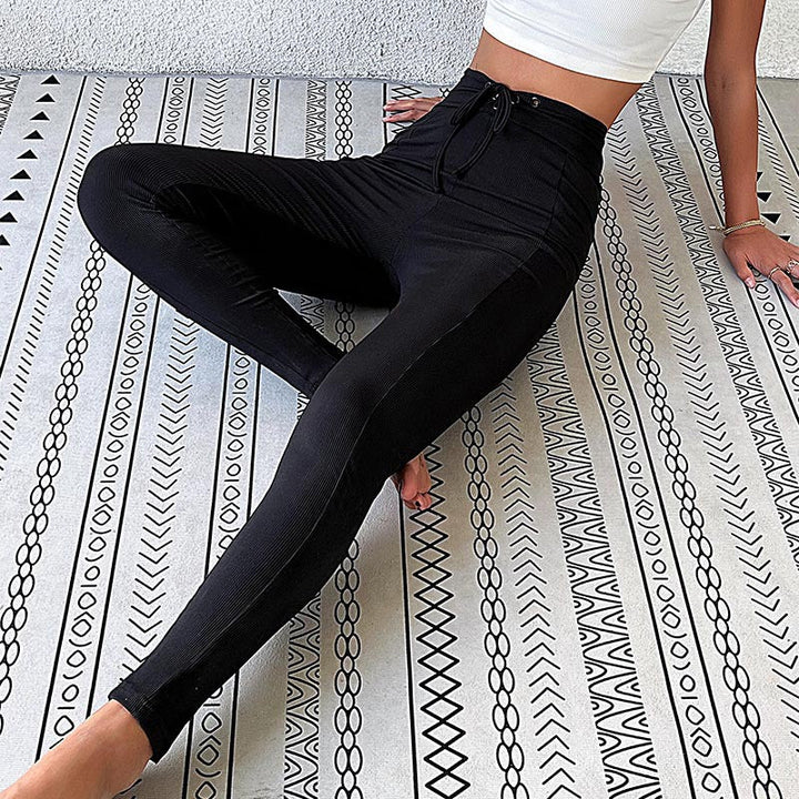 Damernas höga yogabyxor med elastisk midja och ribbad struktur Mirla-Eva Jonsson