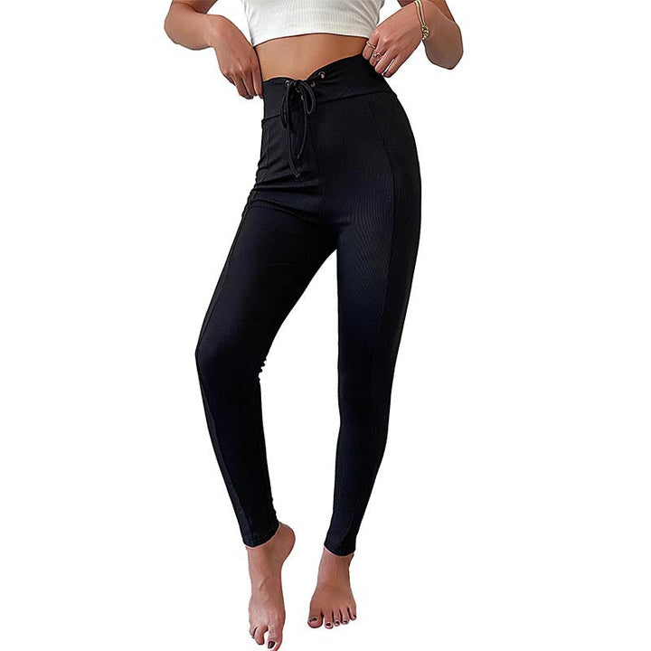 Damernas höga yogabyxor med elastisk midja och ribbad struktur Mirla-Eva Jonsson