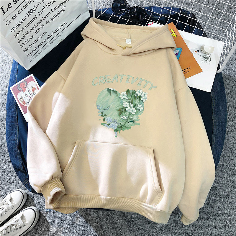 Damernas hoodie med kreativ hjärtmotiv Mirla-Eva Jonsson