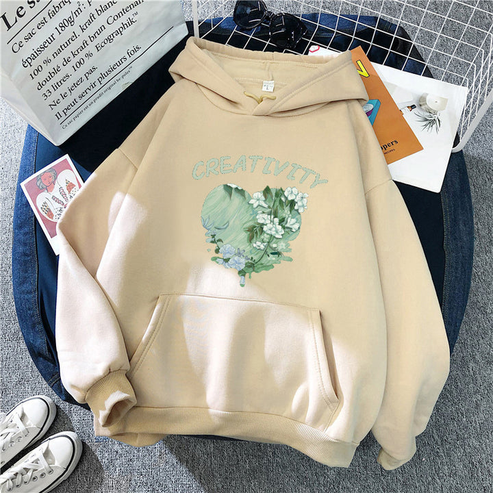 Damernas hoodie med kreativ hjärtmotiv Mirla-Eva Jonsson