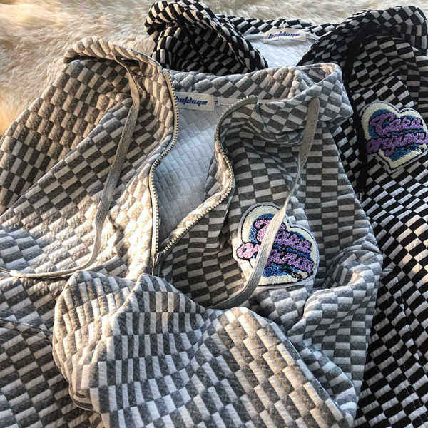 Damernas hoodiejacka med texturerat mönster och hel dragkedja-Eva Jonsson