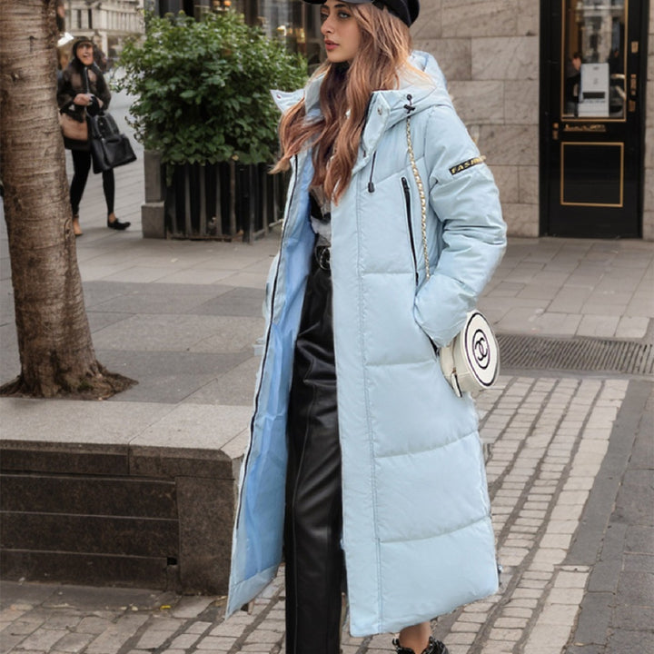 Damernas isolerade lång puffy-kappa med praktisk huva och stilig design Eva Jonsson-Eva Jonsson
