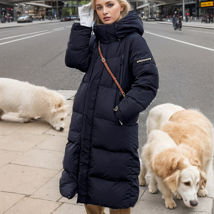 Damernas isolerade lång puffy-kappa med praktisk huva och stilig design Eva Jonsson-Eva Jonsson