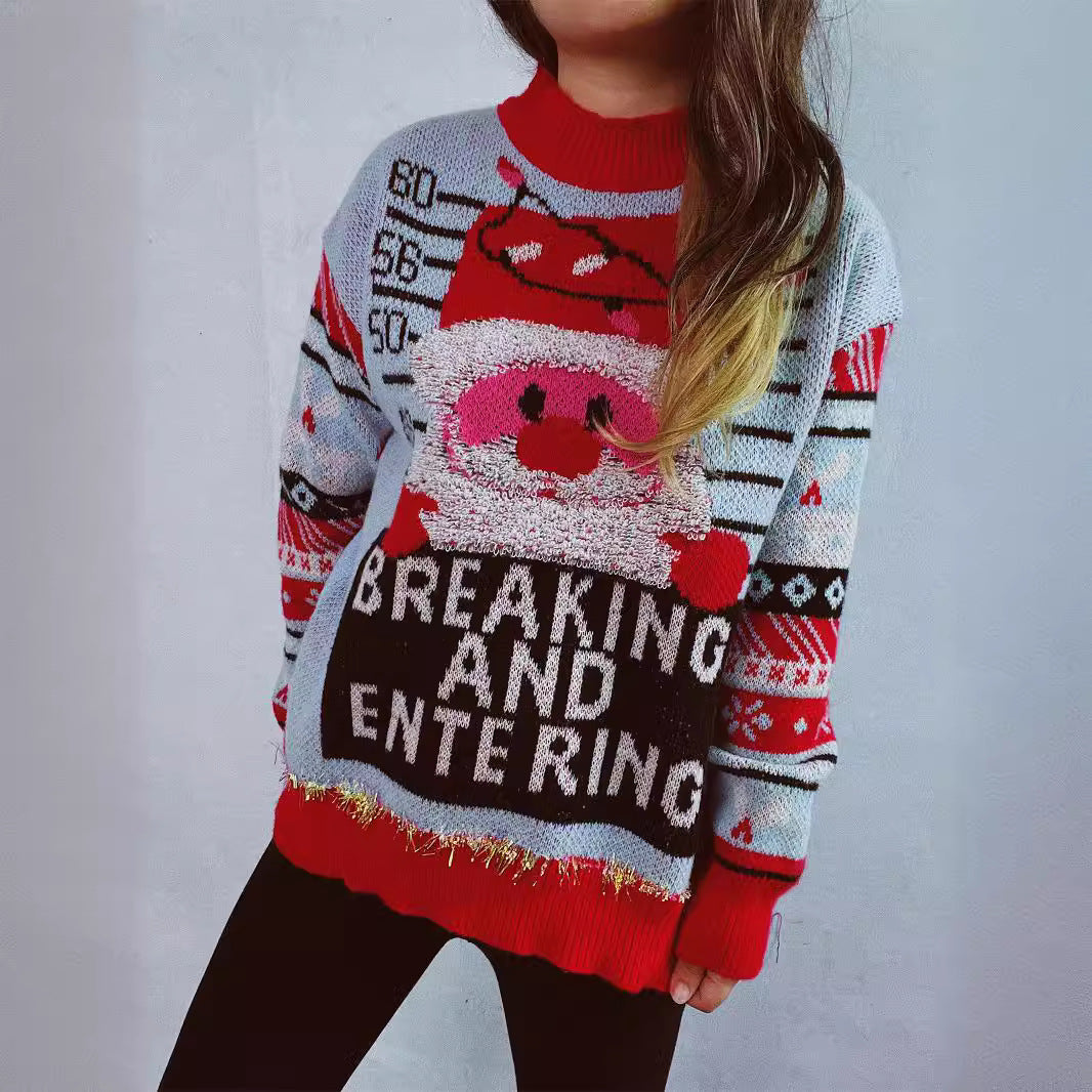 Damernas jultröja med festligt Santa-motiv och glänsande accenter Mirla-Eva Jonsson