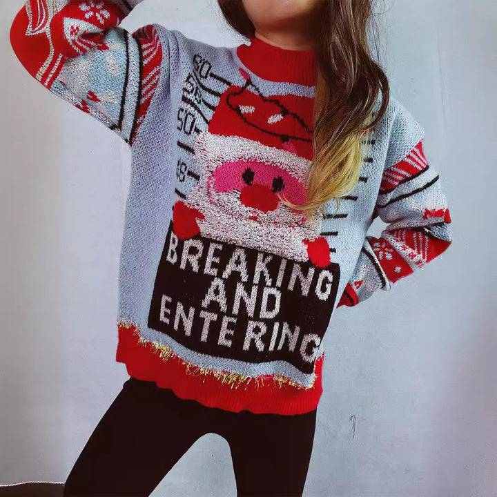 Damernas jultröja med festligt Santa-motiv och glänsande accenter Mirla-Eva Jonsson