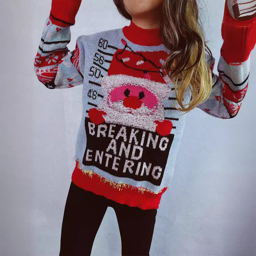 Damernas jultröja med festligt Santa-motiv och glänsande accenter Mirla-Eva Jonsson