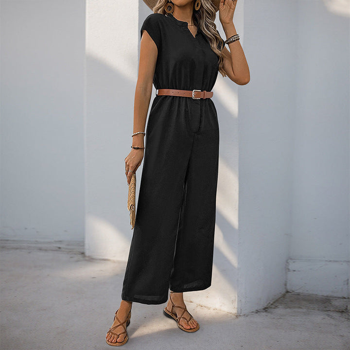 Damernas jumpsuit med elegant midjebälte och modern V-ringning Mirla-Eva Jonsson