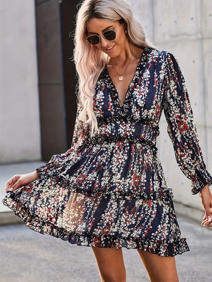 Damernas korta fritidsklänning med volangdetaljer och blommönster Eva Jonsson-Eva Jonsson