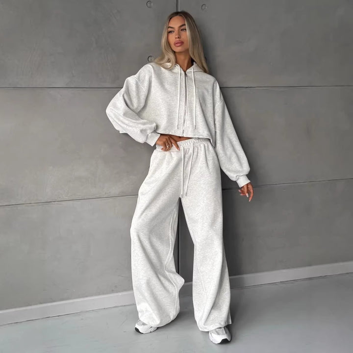 Damernas korta hoodie-träningsoverall i urban stil med avslappnad passform Mirla-Eva Jonsson