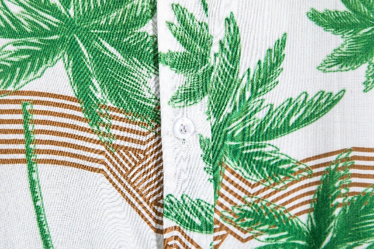 Damernas kortärmad skjorta med tropiskt palmönster och lös passform Mirla-Eva Jonsson