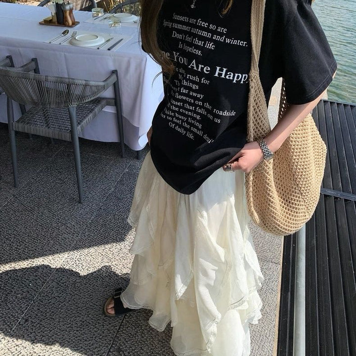 Damernas kortärmad t-shirt med bokstapstryck-Eva Jonsson