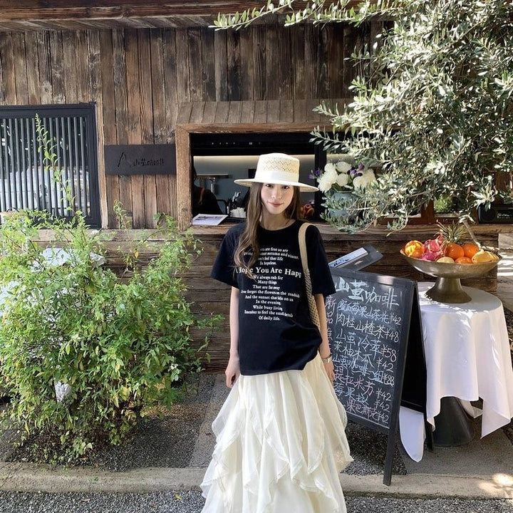 Damernas kortärmad t-shirt med bokstapstryck-Eva Jonsson