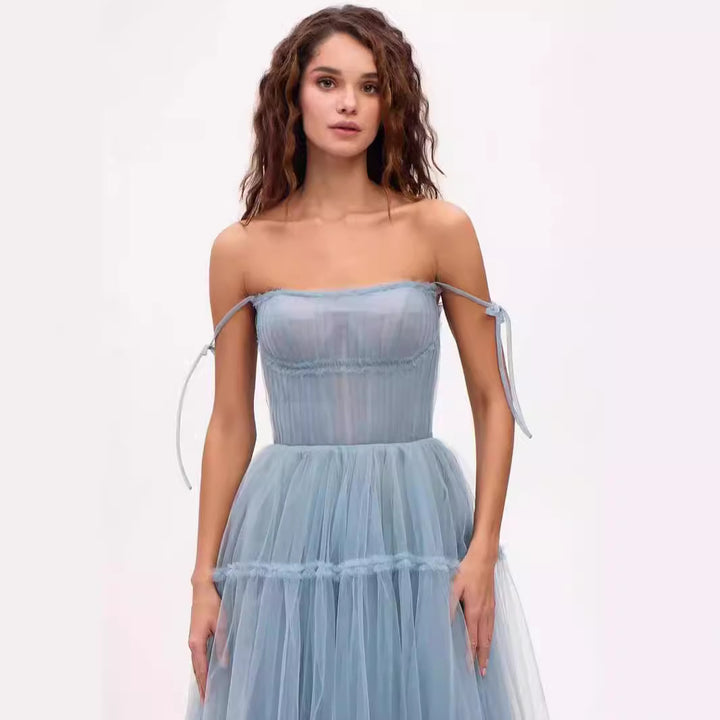 Damernas kvällsklänning tillverkad av den finaste tulle från Mirla-Eva Jonsson