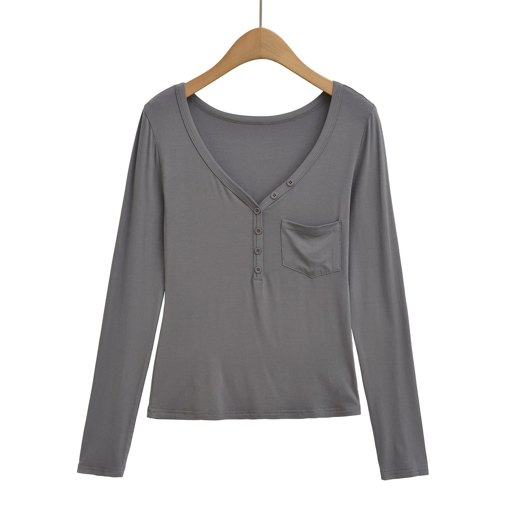 Damernas långärmad basic-t-shirt med knapplist och djup V-urringning Mirla-Eva Jonsson