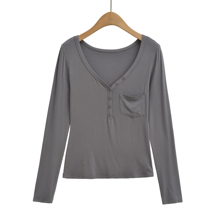 Damernas långärmad basic-t-shirt med knapplist och djup V-urringning Mirla-Eva Jonsson