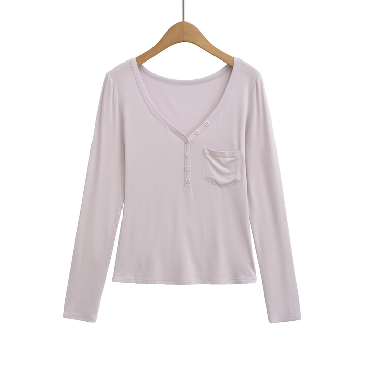 Damernas långärmad basic-t-shirt med knapplist och djup V-urringning Mirla-Eva Jonsson