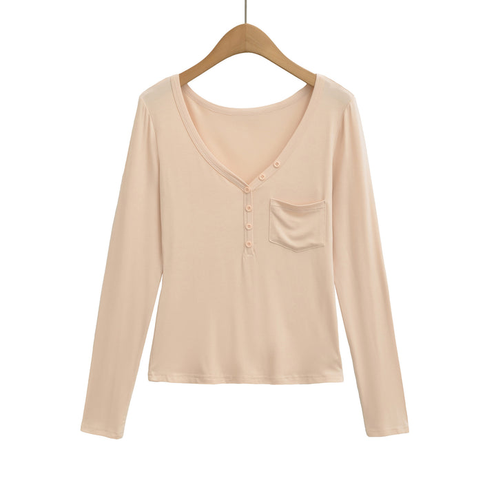 Damernas långärmad basic-t-shirt med knapplist och djup V-urringning Mirla-Eva Jonsson