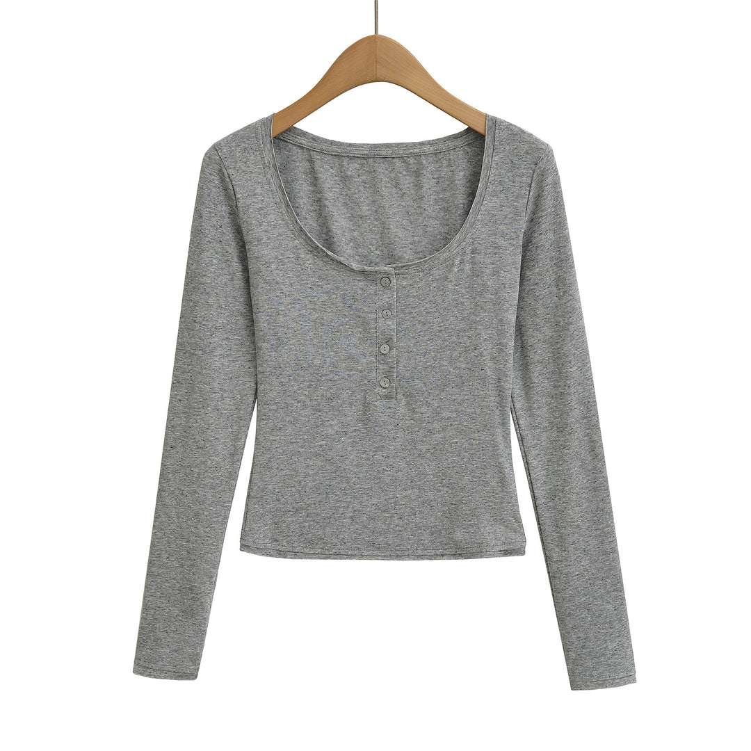 Damernas långärmad basic topp med rundhals och knapplist Mirla-Eva Jonsson